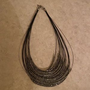 Sparkly necklace will brighten any sweater top or simple black dress.
